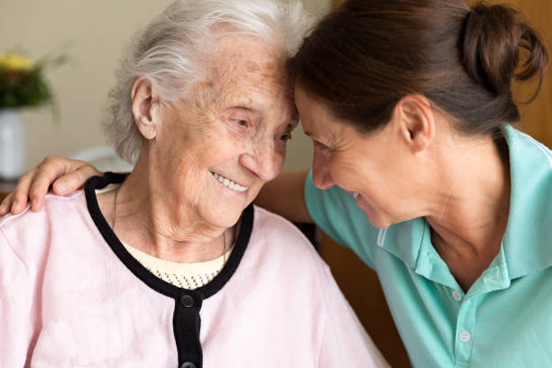 What is Alzheimer's and Dementia? - Dementia and Occupational Therapy - Home caregiver and senior adult woman
