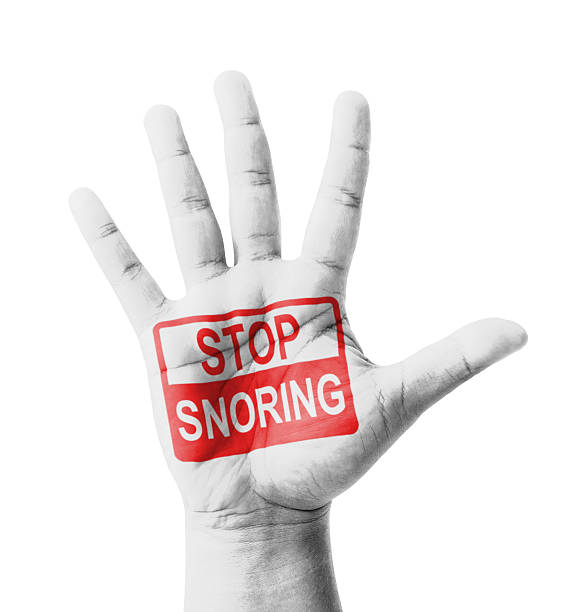 Open hand raised, Stop Snoring sign painted, multi purpose concept - isolated on white background