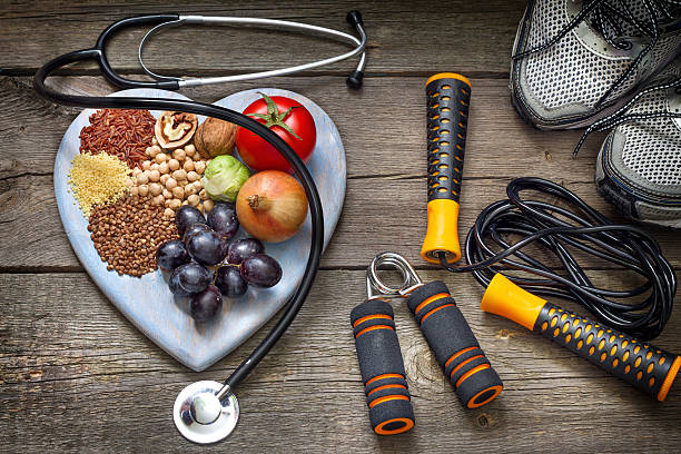 Dash Diet - Healthy lifestyle concept with diet and fitness on wooden boards