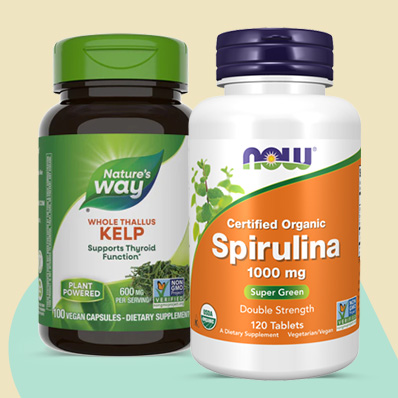 A bottle of Nature's Way Whole Thallus Kelp supports thyroid function. beside a bottle of Now Certified Organic Spirulina.