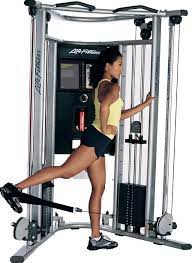 A white woman using a Life Fitness G7 Home Gym.