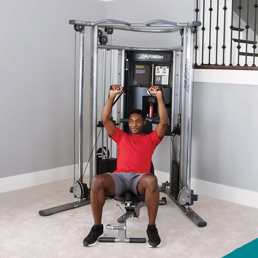 Life Fitness G7 Home Gym Review - A black man using a Life Fitness G7 Home Gym.
