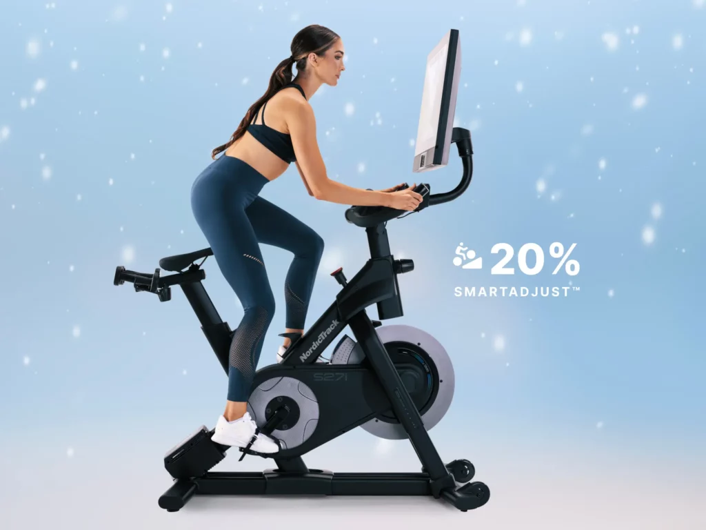 NordicTrack Exercise Equipment - A woman on a NordicTrack Bike with a screen.