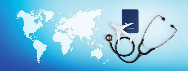Travel is Good for the Health - international medical travel insurance concept, stethoscope, passport and airplane on blue background with map